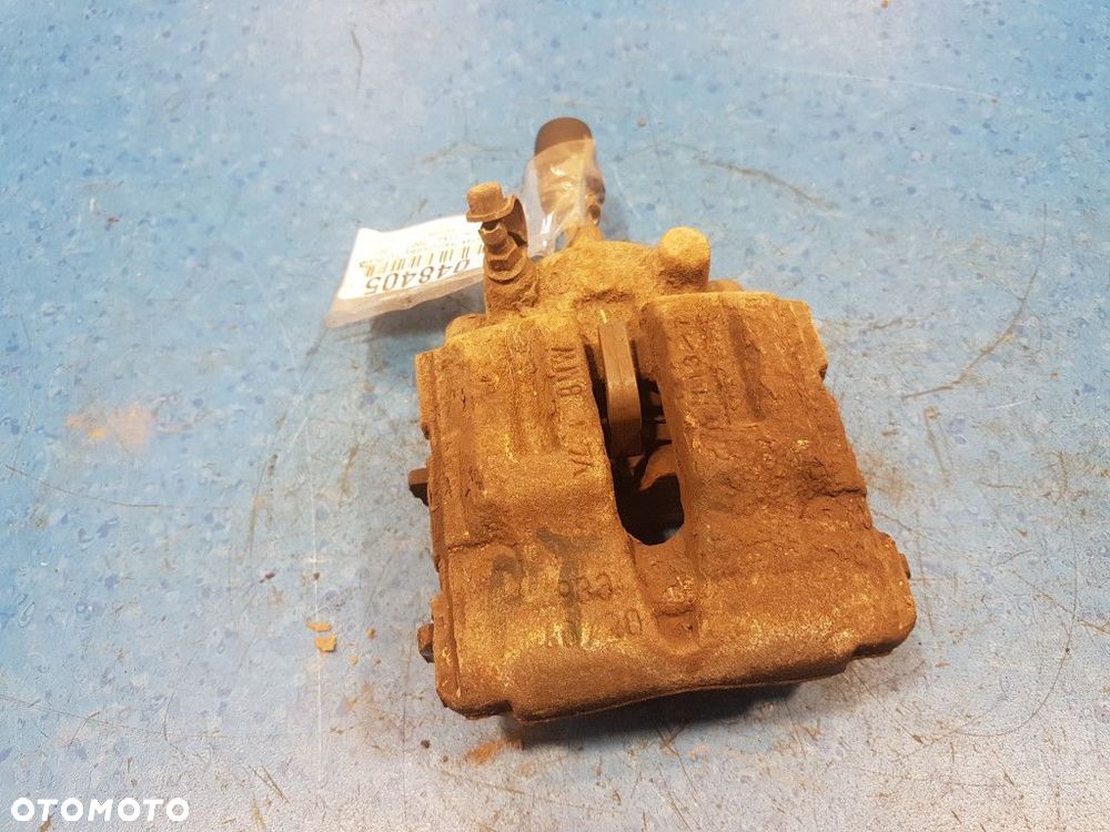 BMW 1 E87 2.0D ZACISK HAMULCOWY TYŁ PRAWY  N47 - 3