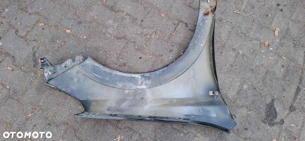 Blotnik lewy opel Astra H - 3