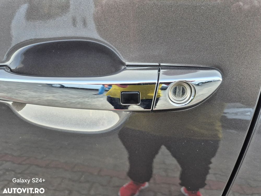 Hyundai Tucson 2.0 CRDI 4WD 6AT Premium+ - 16