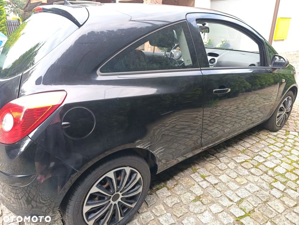 Opel Corsa 1.4 16V Essentia - 27