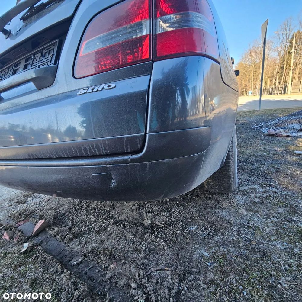 Fiat Stilo 1,6 B 76 kW / 103 KM (2003 kombi) (kod lak: 675) pojazd na części: maska, zderzak, drzwi, szyby, lusterka, chłodnica ... - 23
