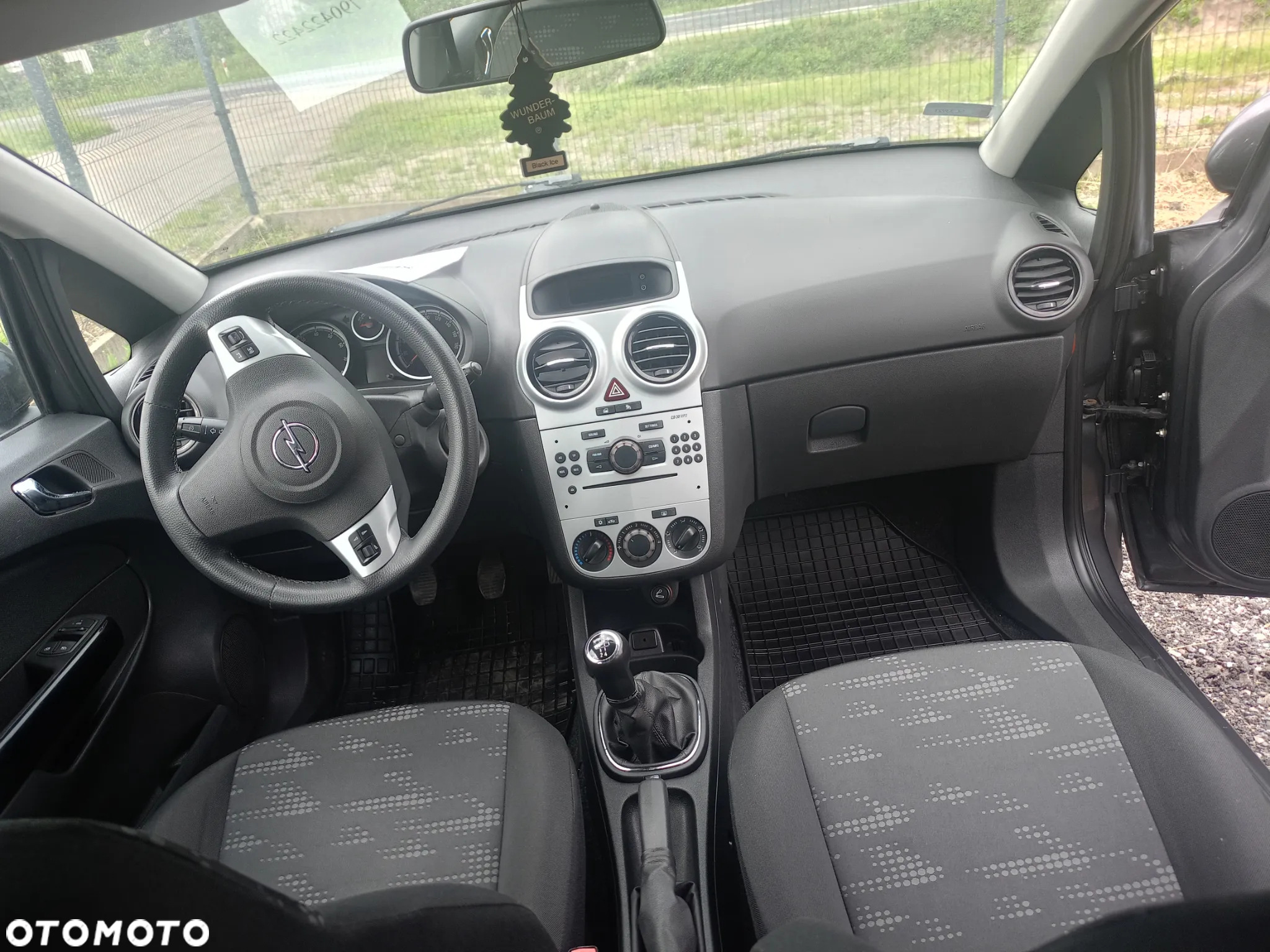 Opel Corsa 1.2 16V Enjoy - 11