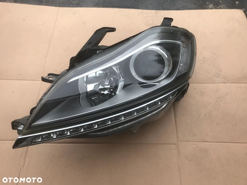 Lancia Delta 08-14 Reflektor Lampa Lewy Przód Bi-Xenon - 1