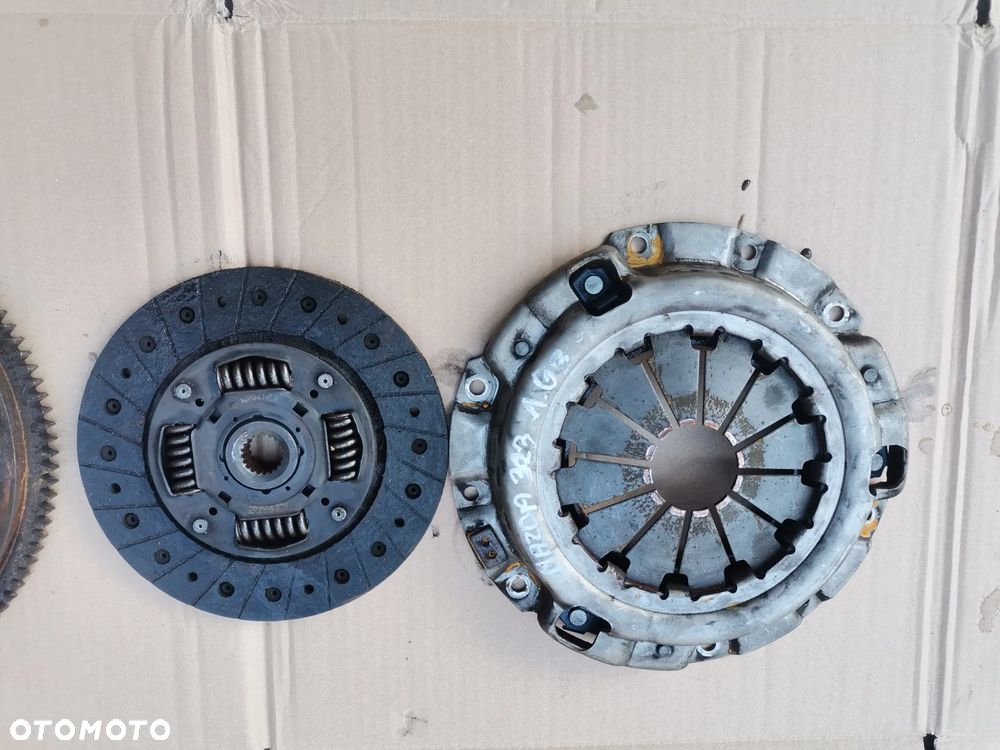 SPRZEGLO TARCZA DOCICK MAZDA 323 1.6 B - 5