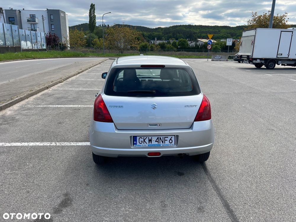 Suzuki Swift 1.3 Club - 8