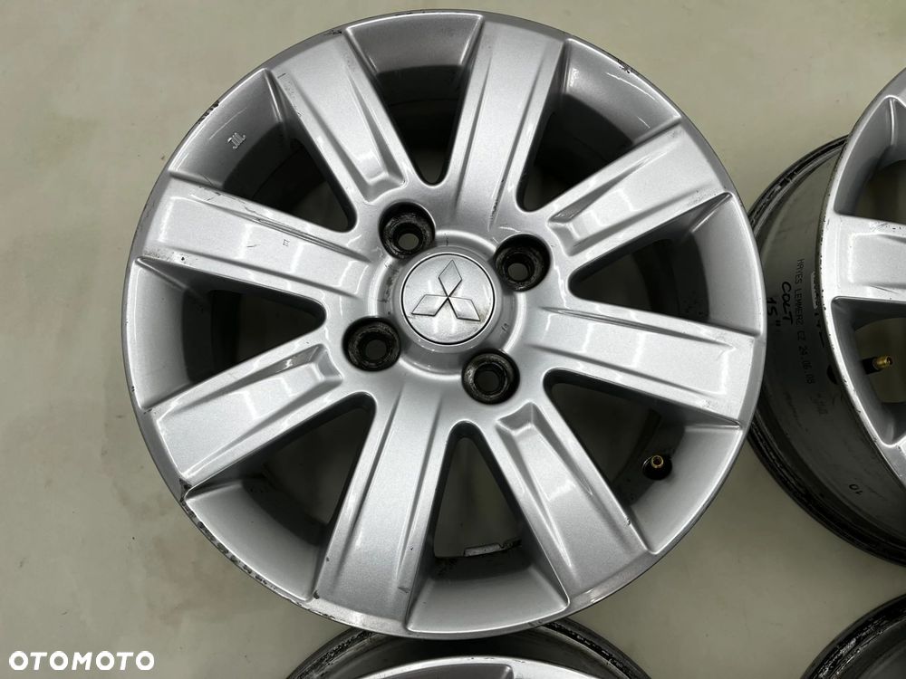 Felgi aluminiowe Mitsubishi Colt VI 6 Z30 04-12r. r15 cali 6jx15 ET46 4x114,3 CH67 felgi oryginalne - 2