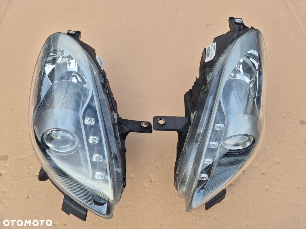 Alfa Romeo Giulietta .Komplet reflektorów.H7.Oryginały.Grafitowe. - 1