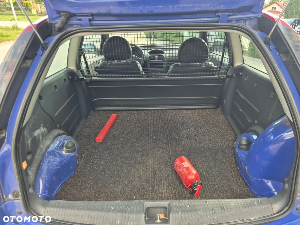 Opel Corsa 1.2 16V Enjoy - 12