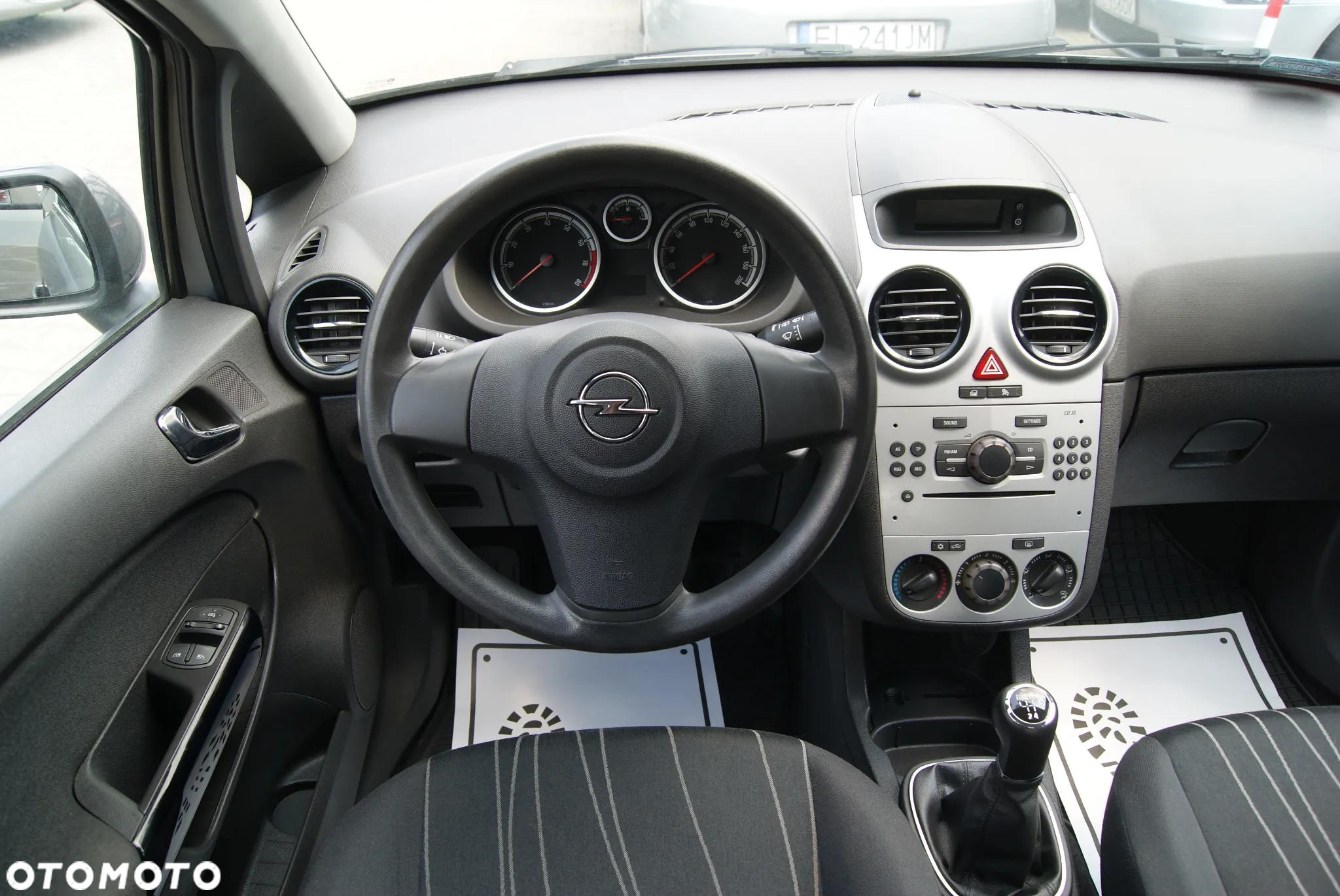 Opel Corsa 1.2 16V Enjoy - 12