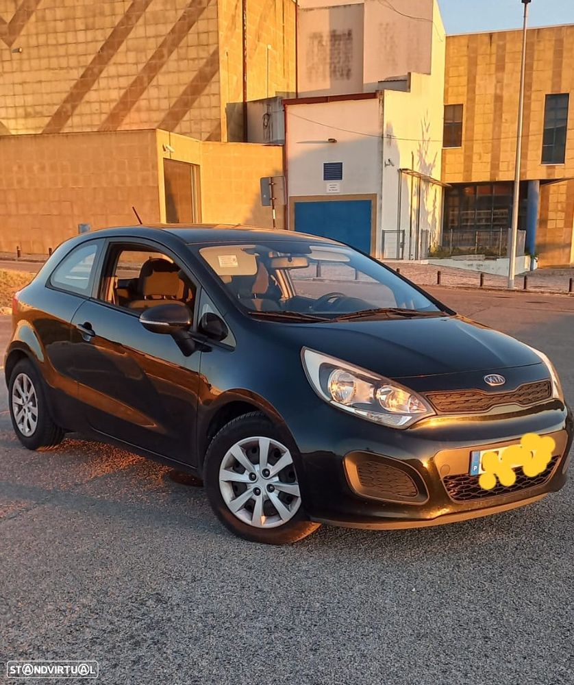 Kia Rio 1.1 CRDi EX - 1