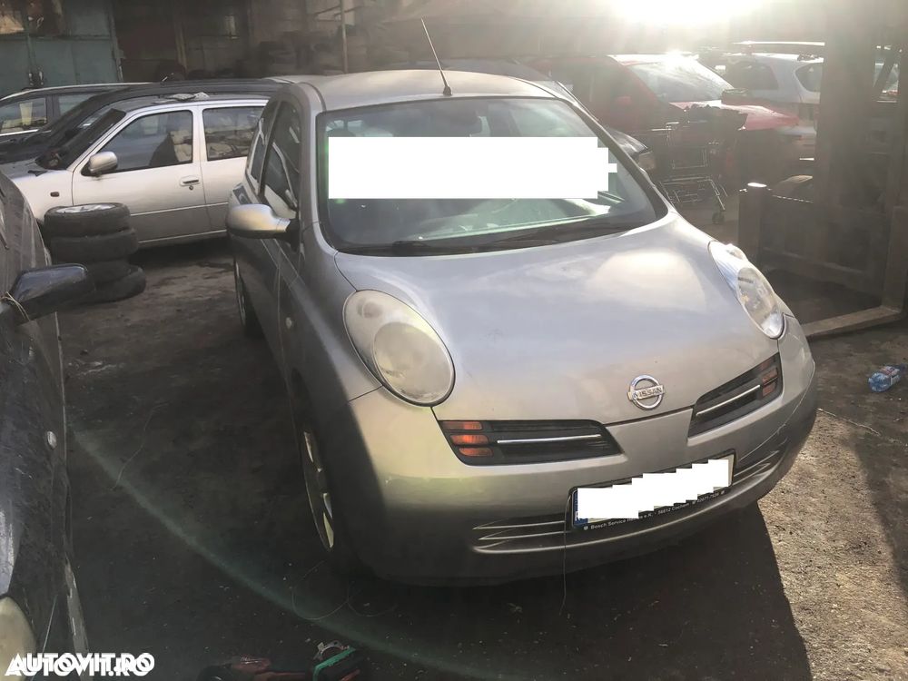 Aripa dreapta fata Nissan Micra 2005 gri argintiu - 1