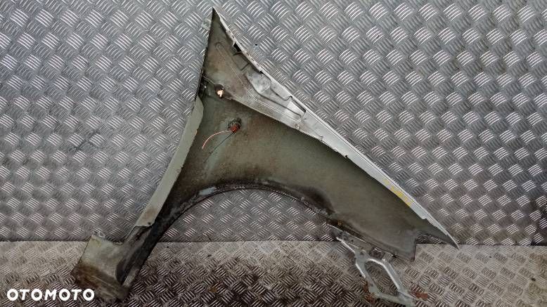 BŁOTNIK LEWY PRZEDNI FIAT PUNTO 2 - 2