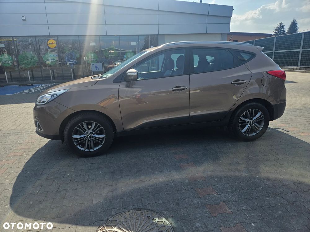 Hyundai ix35 1.7 CRDi 2WD blue Finale Gold - 14