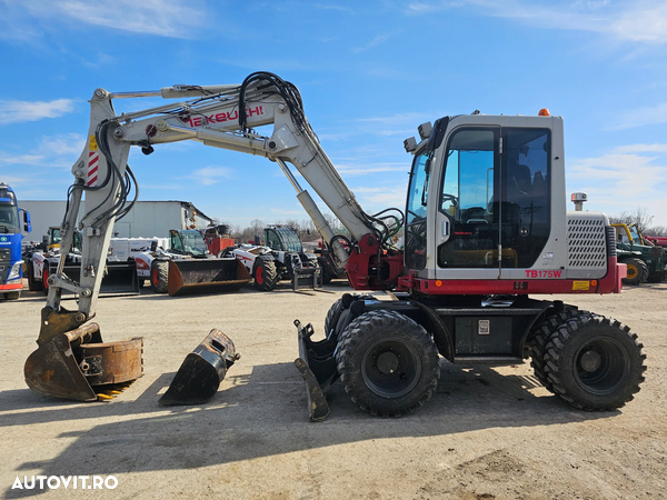 Takeuchi TB175W excavator pe roti 4 cupe  pe pneuri buldoexcavator