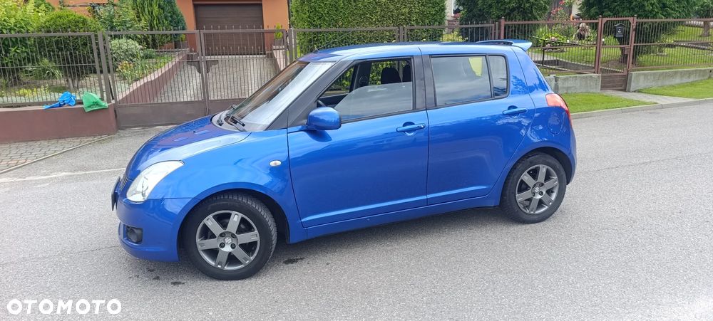 Suzuki Swift 1.3 Club - 3