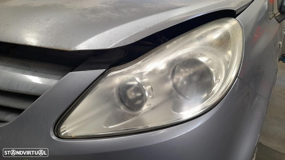 Ótica / farol esquerda OPEL Corsa D - 1