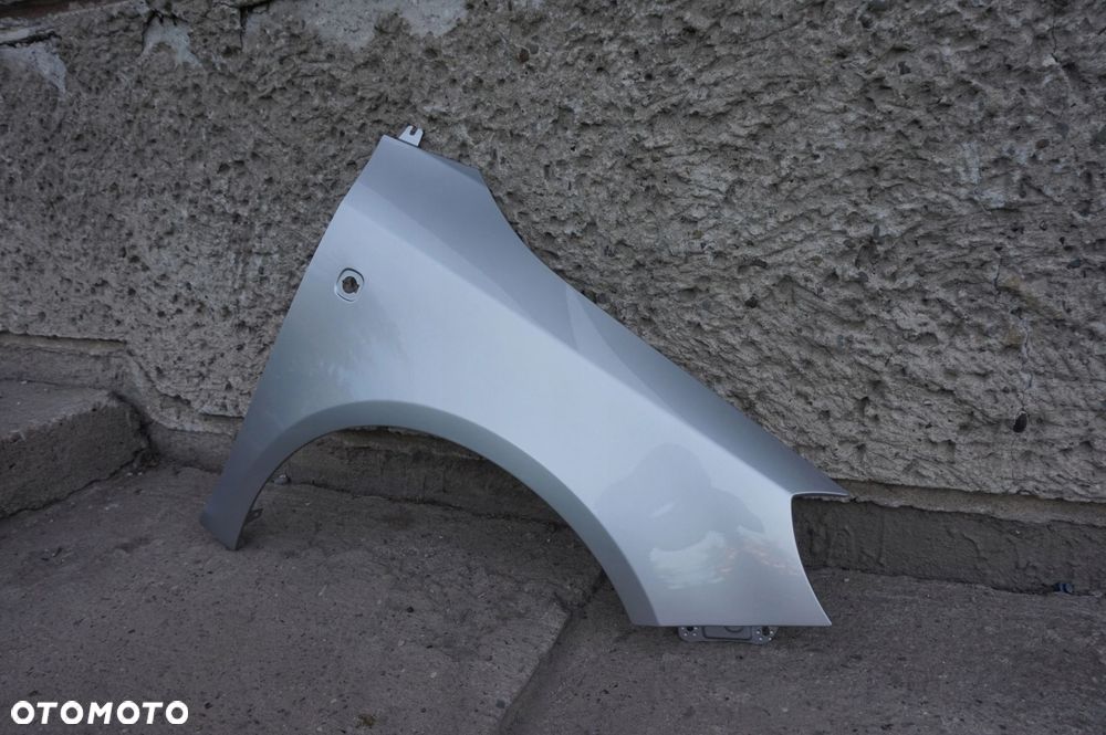 BŁOTNIK PRAWY SKODA FABIA II 2 ROOMSTER 9102 - 3