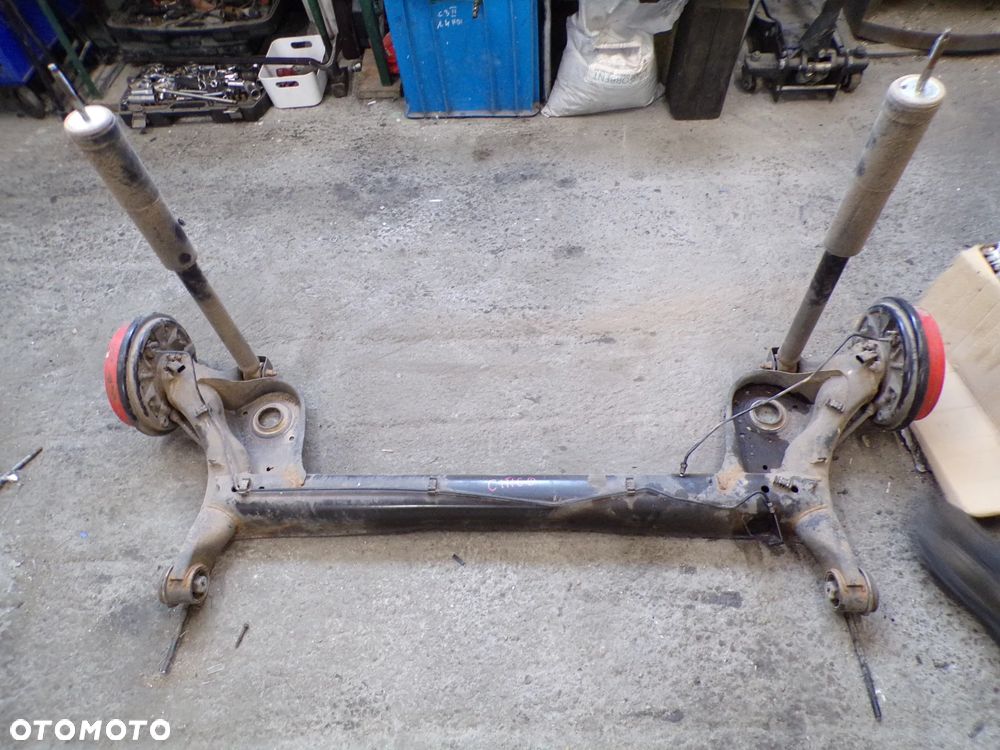 BELKA OŚ ZAWIESZENIA TYŁ SKODA CITIGO SEAT MII VOLKSWAGEN UP - 1