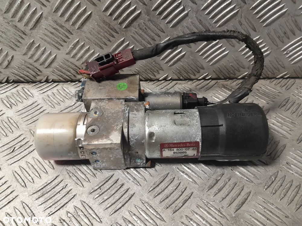 MERCEDES GL X164 MECHANIZM POMPA KLAPY 1648000748