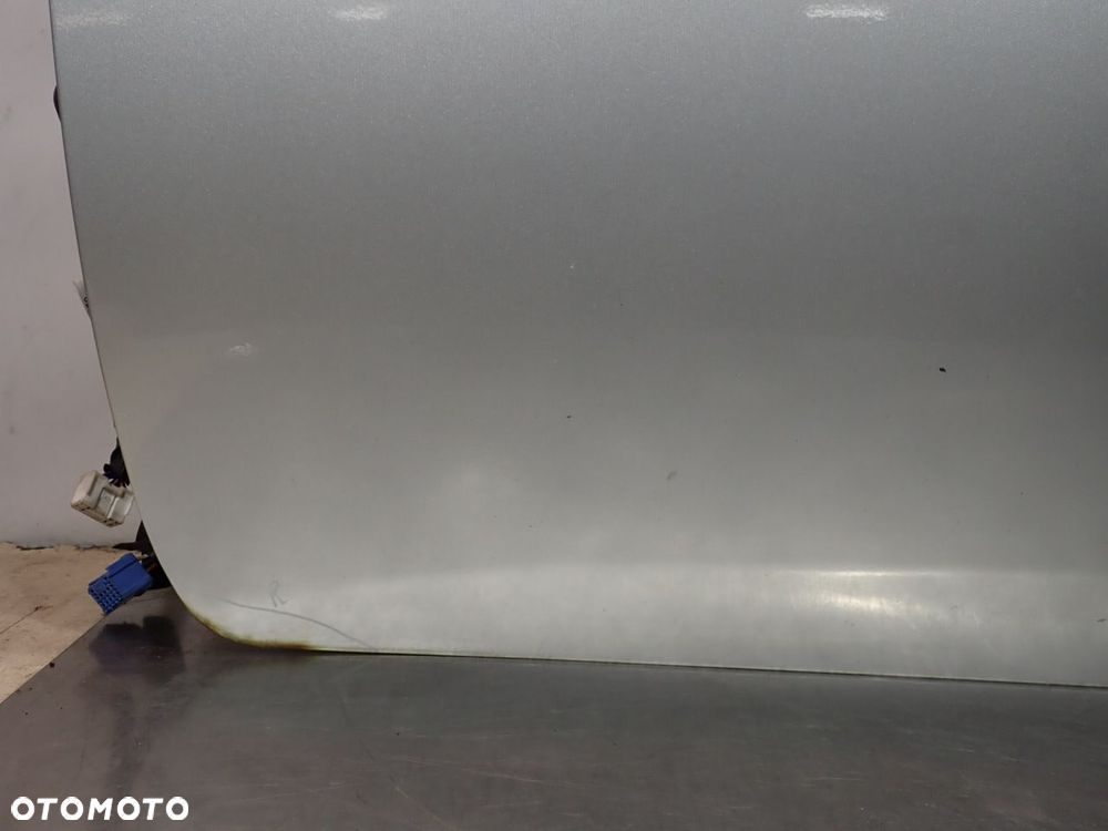 DRZWI LEWY PRZÓD TOYOTA COROLLA E15 KOL: 1F7 - 11