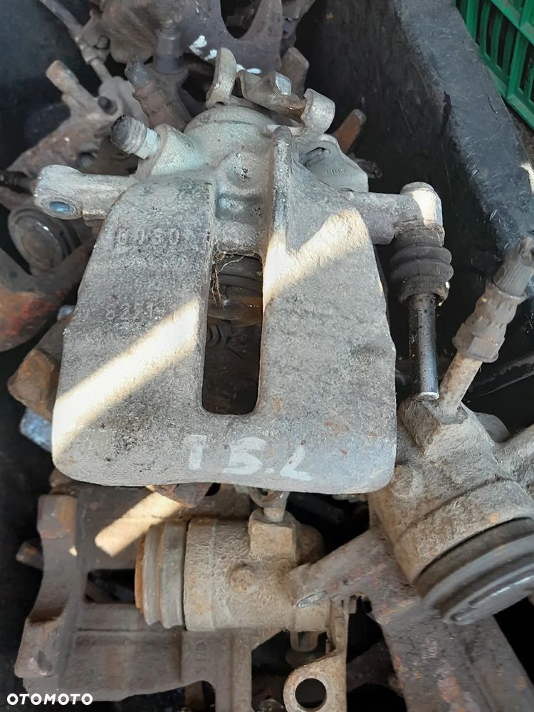 Zacisk lewy tył VW T5 - 1