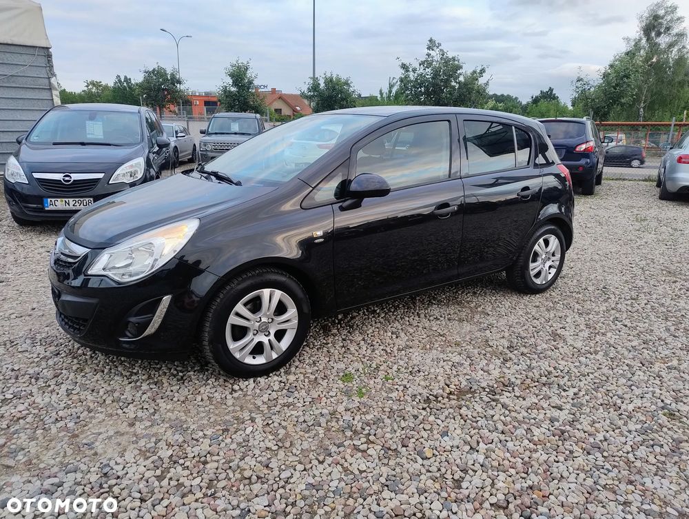 Opel Corsa 1.4 16V Enjoy - 1