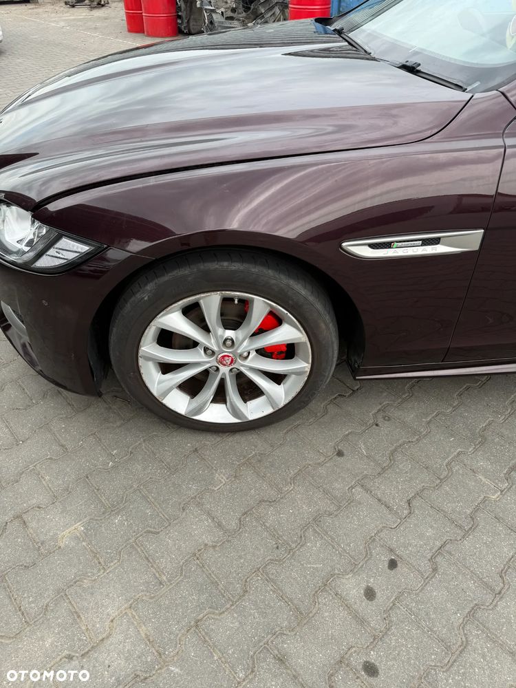 JAGUAR XF X260 CBR AURORA RED R-SPORT BŁOTNIK LEWY PRZEDNI