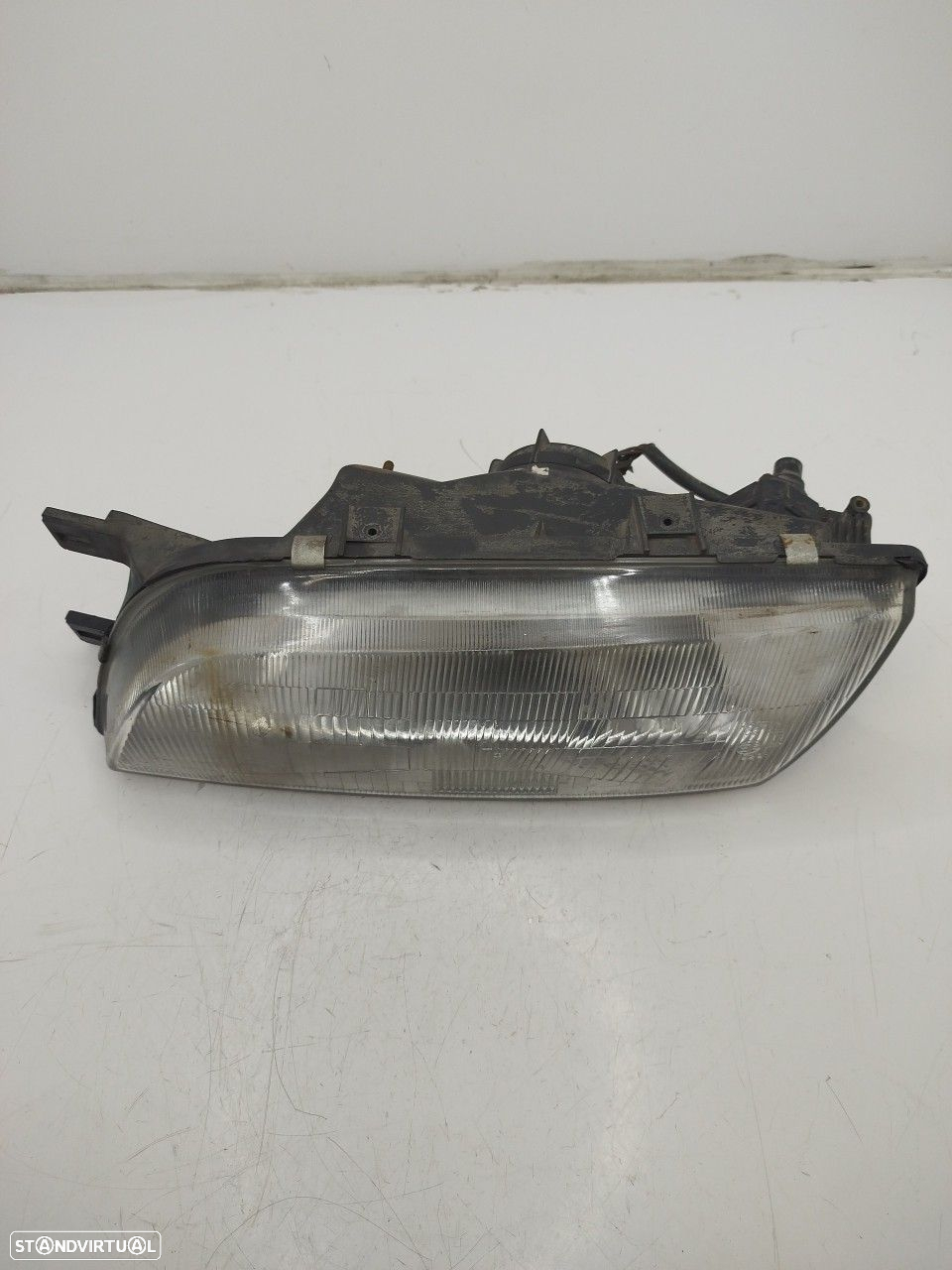 Farol/ Otica Dianteiro Esq Nissan Almera I Hatchback (N15) - 2