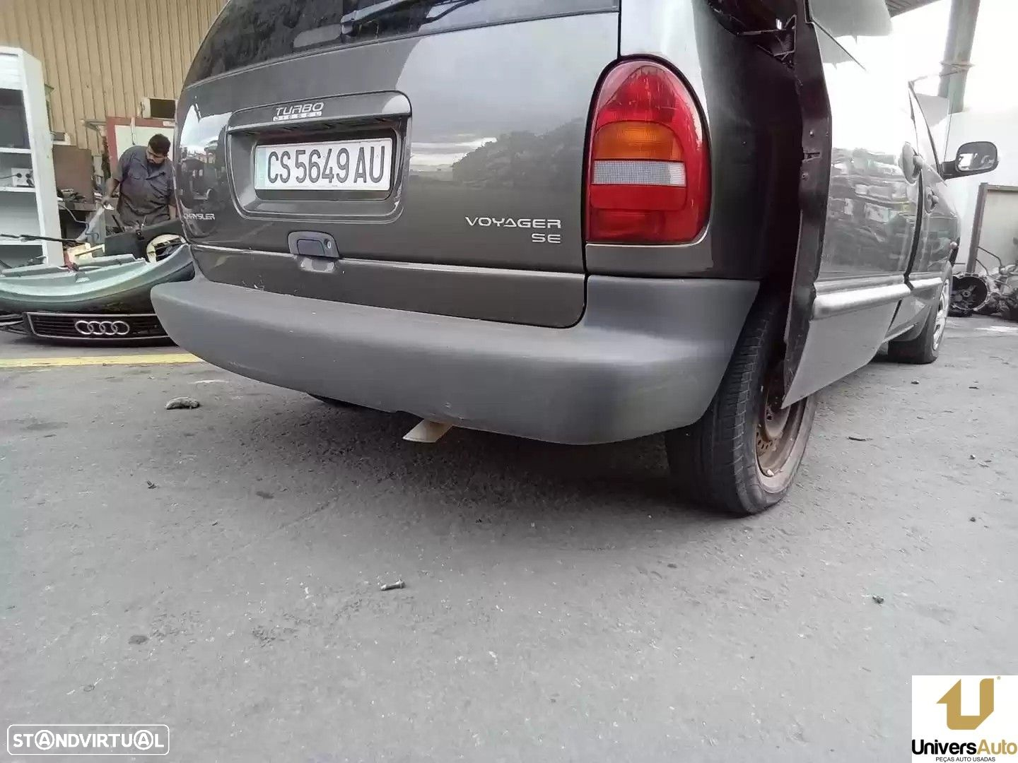 PARA-CHOQUES TRASEIRO CHRYSLER VOYAGER / GRAND VOYAGER III 1999 - - 2