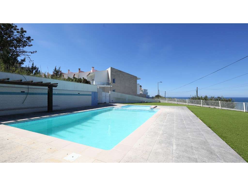 Moradia V2+1 em banda com vista frontal sobre o oceano e as icónica... - Grande imagem: 4/36