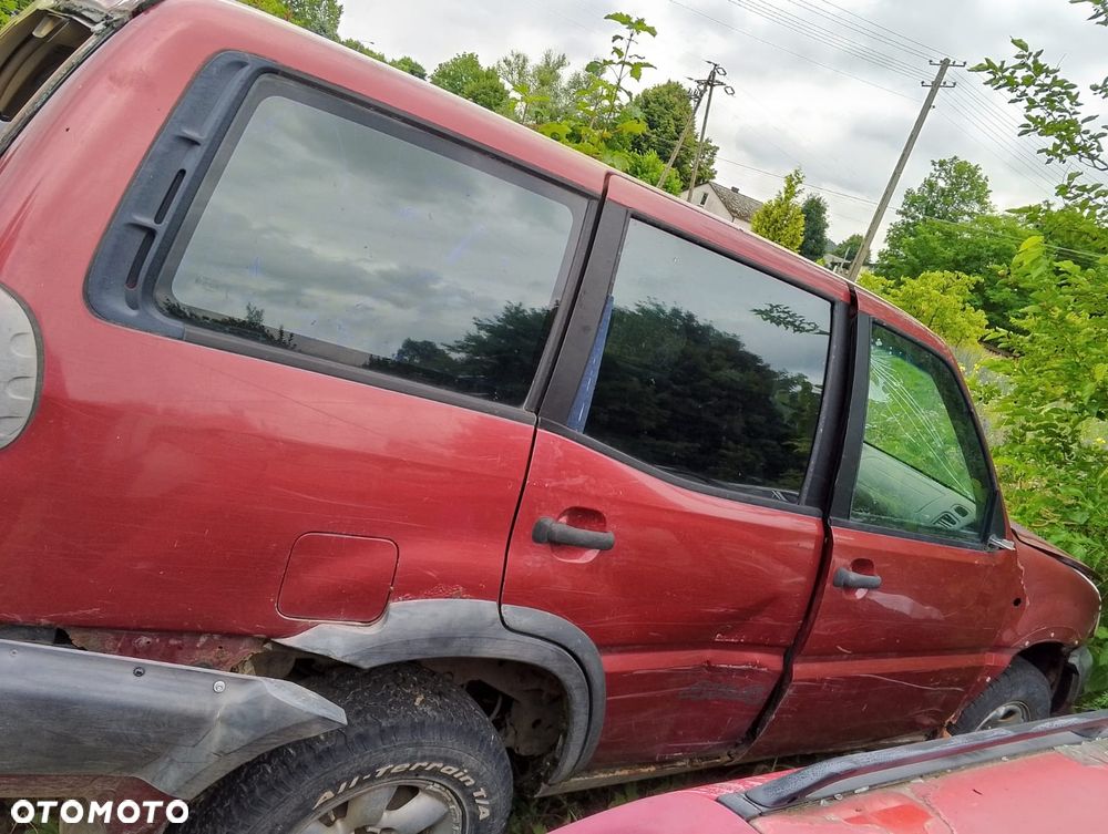 Nissan Terrano (86-06r.) 2.7 B 125KM. Silnik TD28TI Skrzynia . Cały na części. GWARANCJA !!!  Przód Tył Zestaw Komplet Drzwi Klapa Zderzak Błotnik Maska Grill Atrapa Szyba Pas Lampa Lusterko Boczki Fotel Kanapa Kokpit Deska Rozdzielcza Przełącznik Włącznik Sterownik Przewody Wiązka Instalacja Moduł Komputer Czujnik Listwa Pompa Alternator Wtryski Głowica Rozrusznik Kompresor Sprzęgło Dwumas Silnik Skrzynia ABS Klimatyzacji Paliwa Wspomagania Kolektor Turbina Przepustnica Zawór Chłodnica Koło Hak Belka Sanki Zawieszenie Mcpherson Półoś Amortyzator Wydech Tłumik Zacisk Most - 2