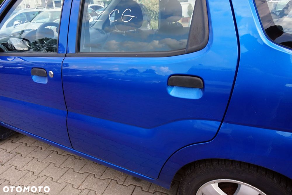 DRZWI TYLNE LEWE JUSTY III G3X ZCG  NIEBIESKI SUBARU 2003-2007 - 2