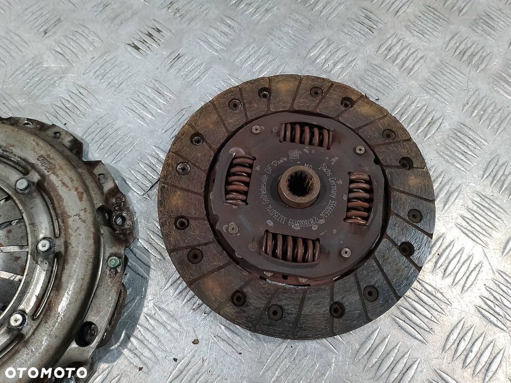 DOCISK SPRZEGŁA TARCZ SPRZEGŁOWA OPEL CORSA D 55565534  332350714 1.2 16V - 5