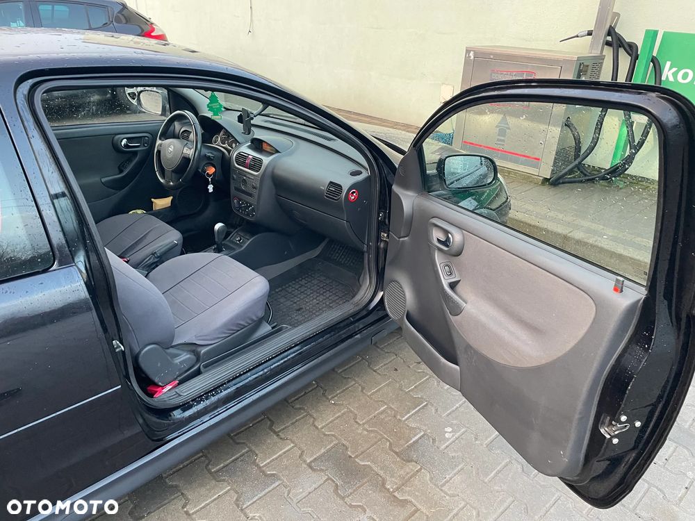 Opel Corsa 1.2 16V Cosmo Easytronic - 26