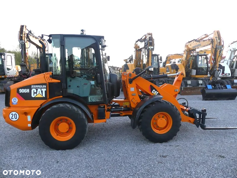 Caterpillar CAT 906H / Z Niemiec / 6424mtg / - 5