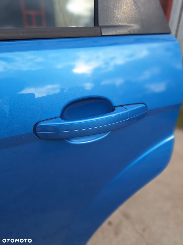 klamka drzwi przód tył lewa prawa FORD FOCUS mk2 lift   kod Q8