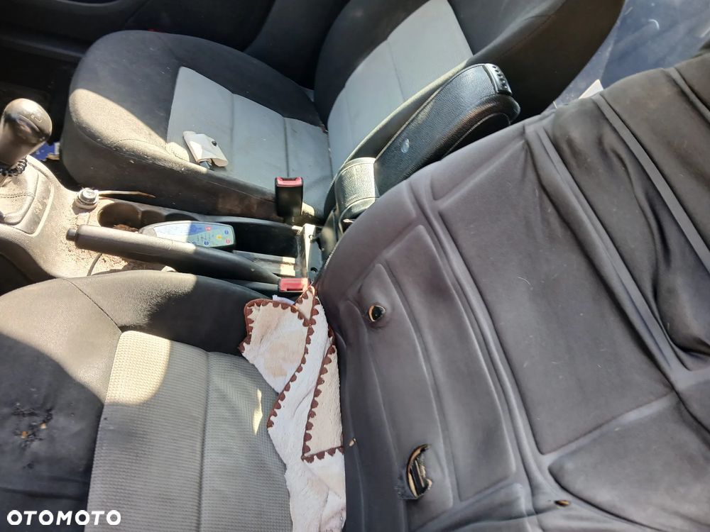 skoda octavia II 2 kombi LA7W fotel fotele kanapa deska kokpit podsufitka boczek boczki klamka - 6