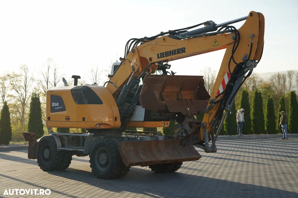 Liebherr 914 COMPACT / EXCAVATOR PE PNEURI / 13.464 ORE DE FUNCȚIONARE / CUPLAJ RAPID HIDRAULIC / CUPĂ HIDRAULICĂ PENTRU NIVELARE / - 13