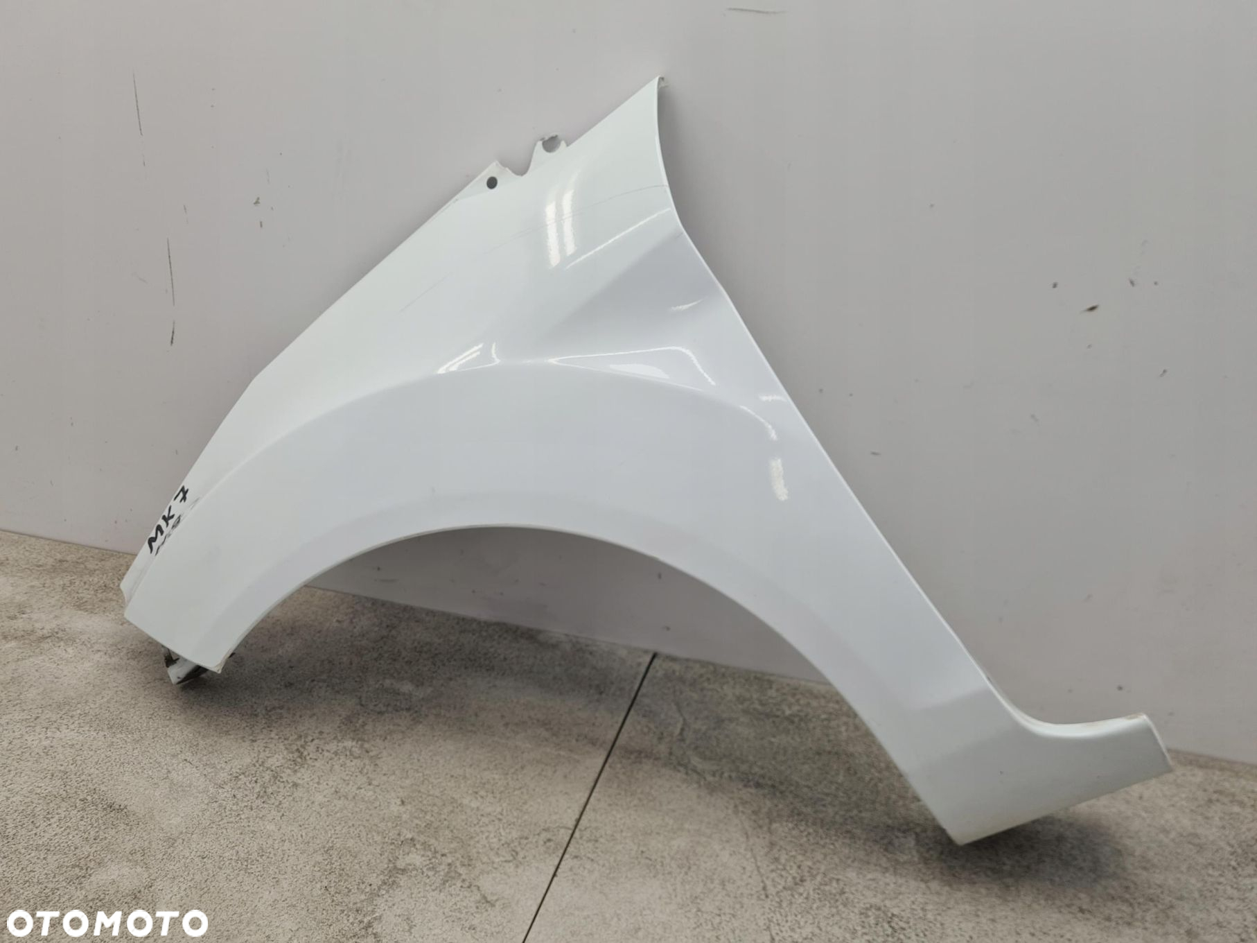 FORD FIESTA MK7 BŁOTNIK LEWY PRZÓD H9 - 12