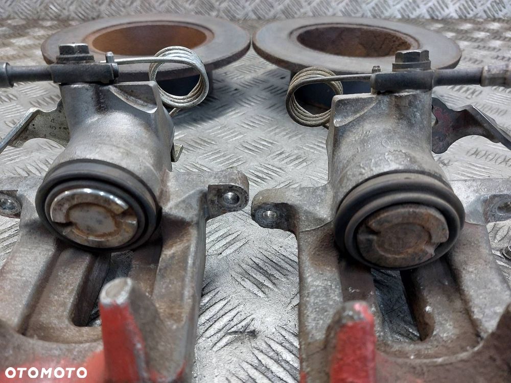 TARCZE HAMULCOWE TYŁ + ZACISKI VOLKSWAGEN PASSAT B5 - 4