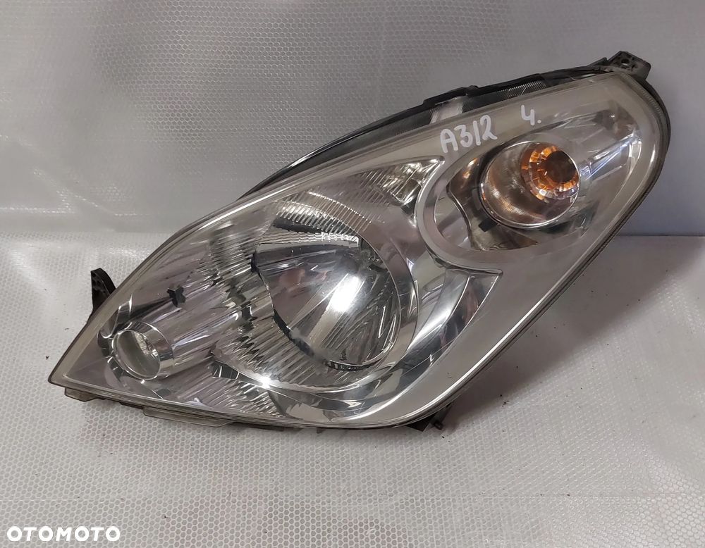 .  LAMPA PRZOD PRZEDNIA LEWA SUZUKI SPLASH - 1