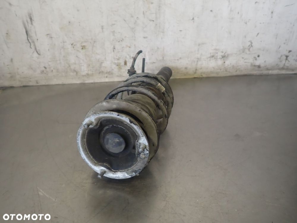 MCPERSON LEWY PRZEDNI BMW E87 - 1