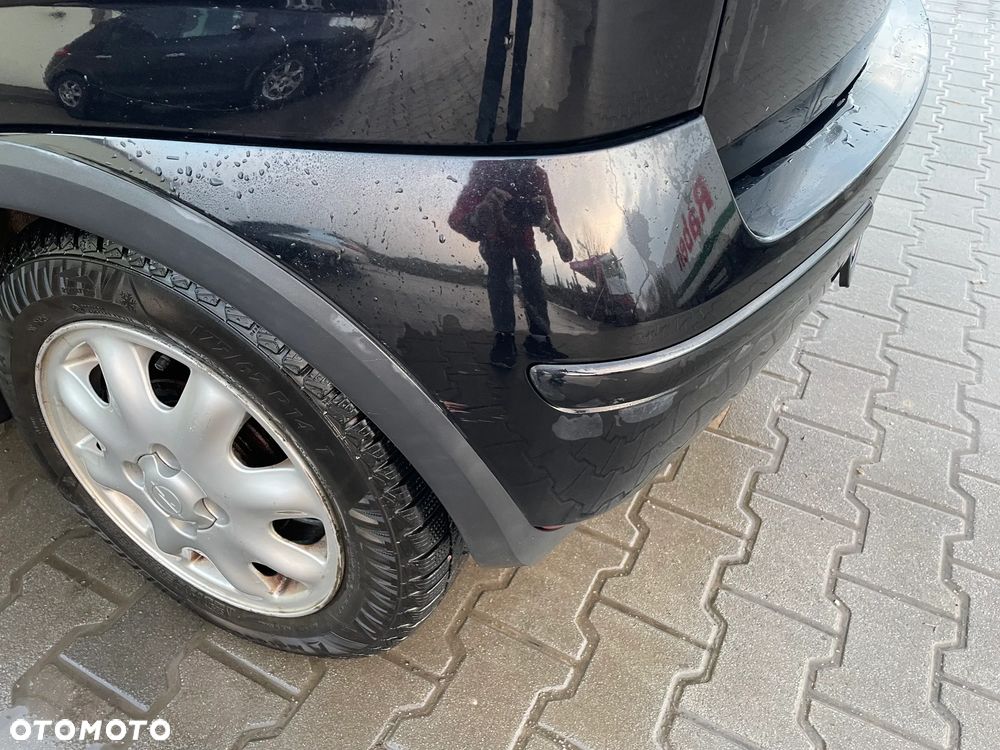 Opel Corsa 1.2 16V Cosmo Easytronic - 11