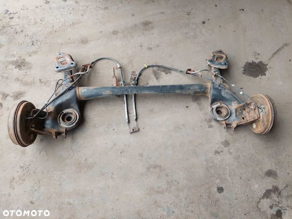 BELKA OŚ ZAWIESZENIA TYŁ BĘBNY Z ABS OPEL CORSA D HB 3D - 1