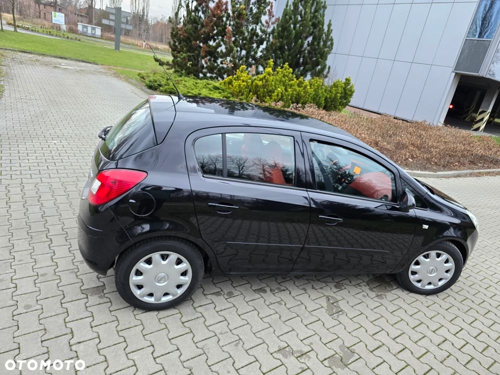 Opel Corsa 1.2 16V Cosmo - 22