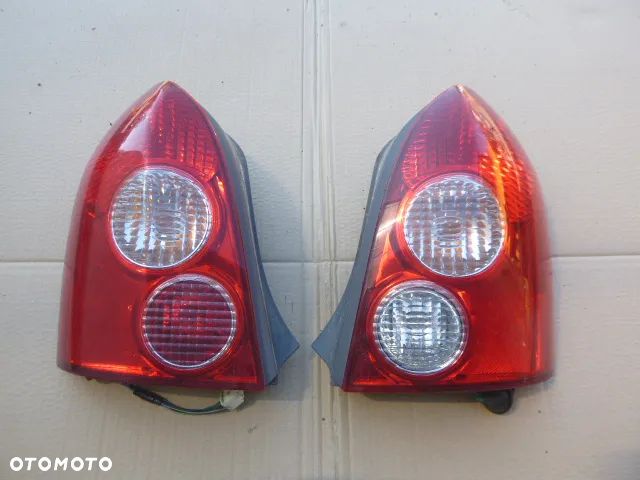 LAMPA LEWY TYŁ PRAWY TYŁ KOMPLET MAZDA 323F LIFT 01-03 - 2