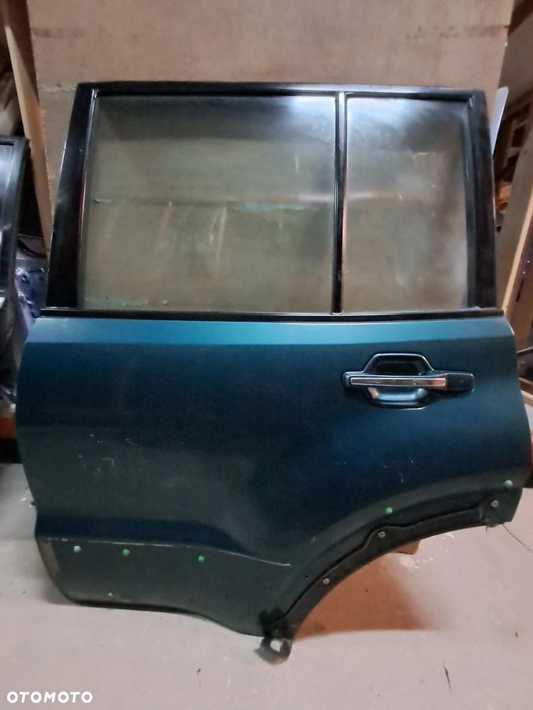 Drzwi Mitsubishi Pajero III 00-06' lewy tył (ciemna zieleń)