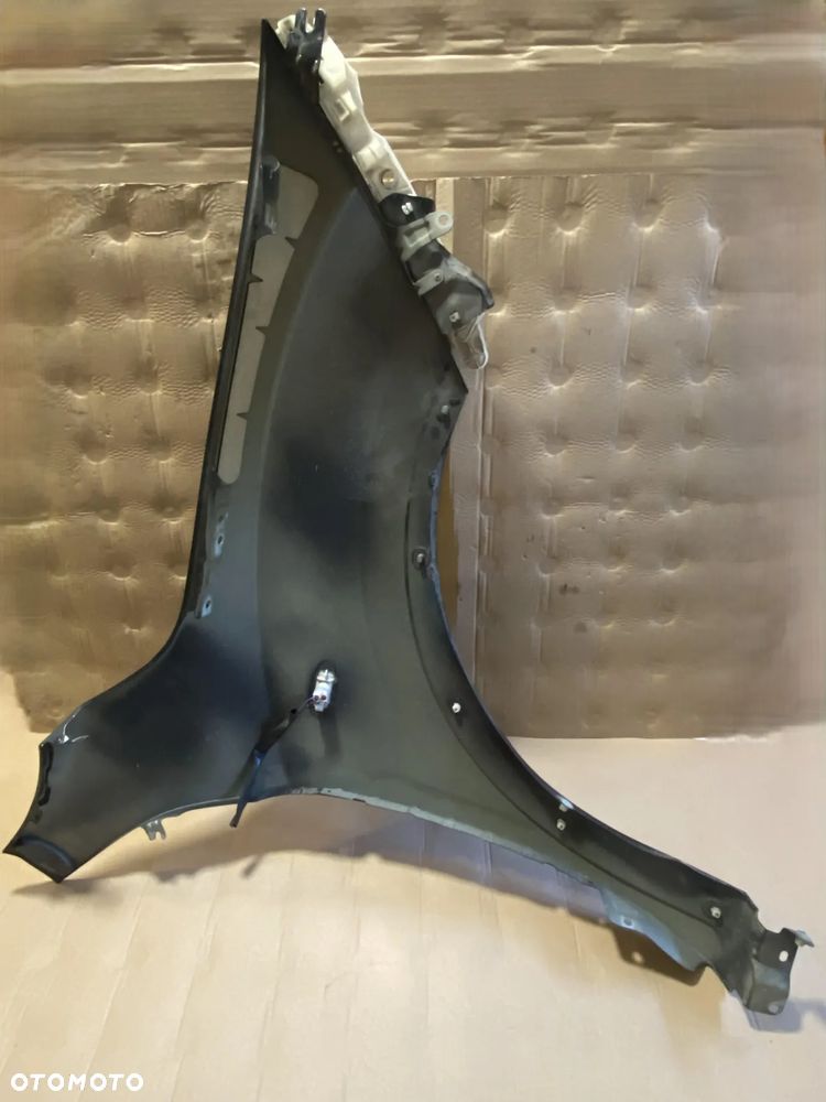 Błotnik Nissan Juke I lewy OE - 5