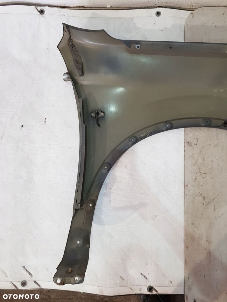 BŁOTNIK LEWY PRZÓD NISSAN QASHQAI J102 2.0 DCI 4X4 EUR 09R B52 - 12