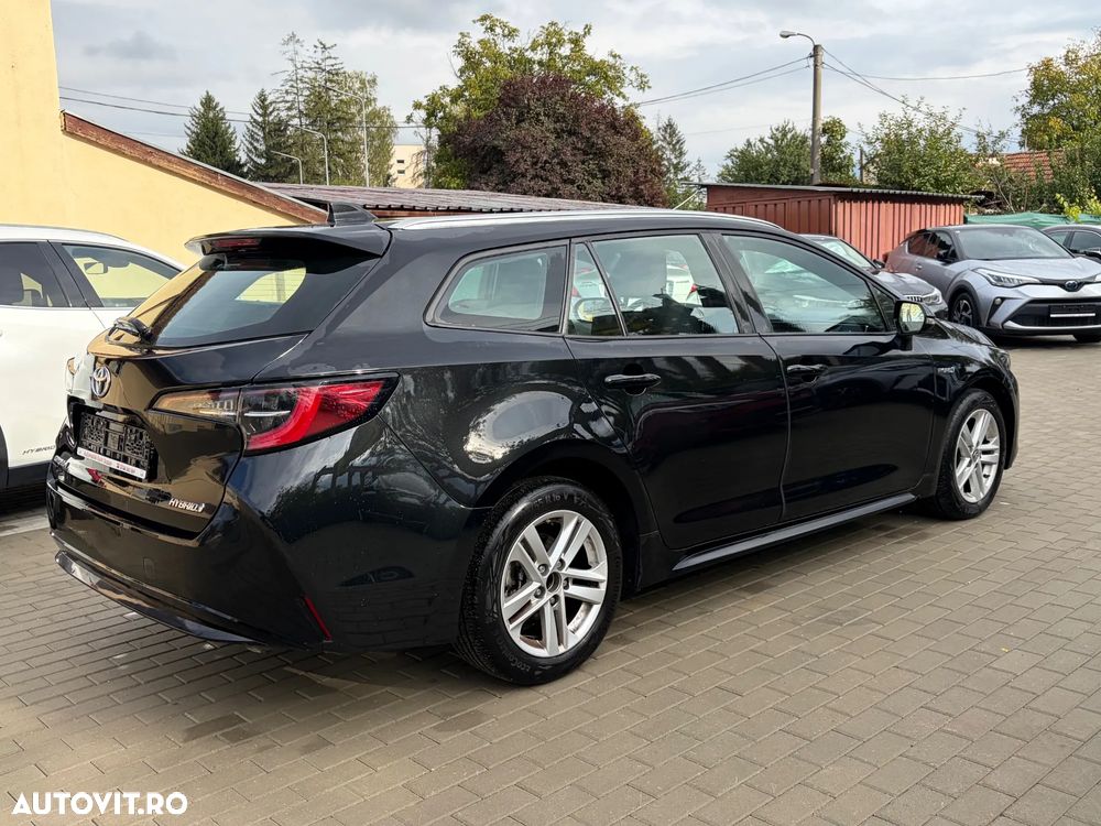 Toyota Corolla 1.8 HSD Business - 8